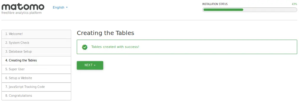 A step-by-step guide on Matomo installation process, showcasing a computer screen with Matomo setup and configuration.